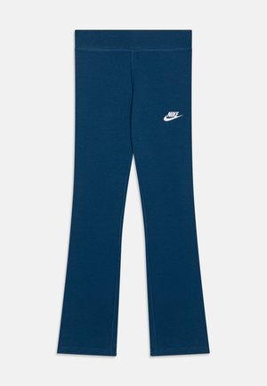Dunkelblaue Nike-Leggings mit schmaler Passform und weißem Nike-Logo am oberen linken Oberschenkel vor weißem Hintergrund.