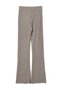 Beige, gerippte Strickhosen mit einem ausgestellten Saumdesign, das eine glatte Textur und einen elastischen Bund bietet. Sie sind knöchellang und eng geschnitten.