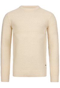 Suéter de punto crema con un patrón texturizado, cuello redondo, mangas largas y puños y dobladillo acanalados.