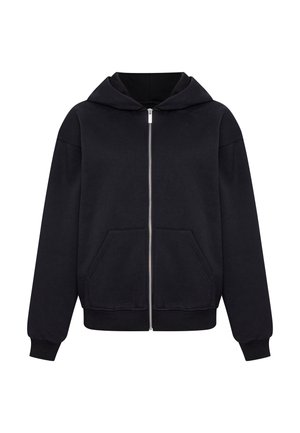 Haut à zip noir avec un ourlet côtelé, des manches longues et deux poches avant. Fabriqué à partir d'un matériau doux avec une texture lisse.