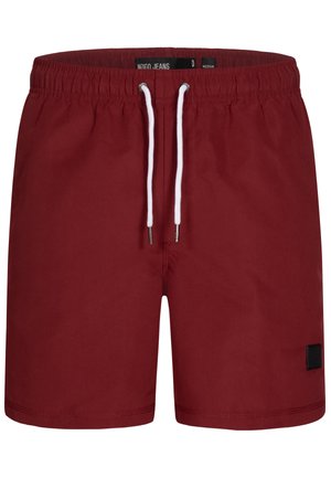 Shorts de bain bordeaux avec une taille élastique, un cordon blanc et une petite patch noire. Fabriqués en matériau lisse et léger.