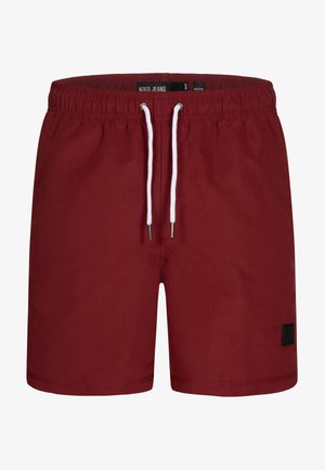 Shorts de bain bordeaux avec une taille élastique, un cordon blanc et une petite patch noire. Fabriqués en matériau lisse et léger.