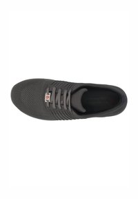 Gray athletic shoe with a textured fabric upper, lace-up design, and a perforated toe area. Features a subtle logo on the side.