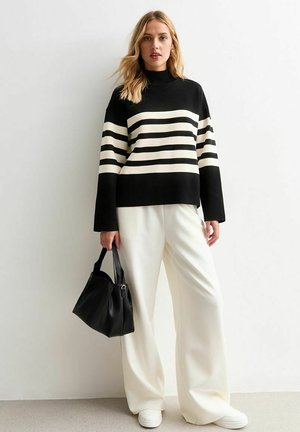 - Sweter
