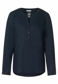 Mörkblå långärmad blus med rund halsringning, knappslå och en lätt rundad nederkant. Slät tyg med en subtil glans.