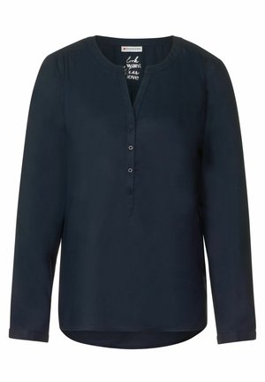 Marineblå langærmet bluse med rund halsudskæring, knaplukning og en let buet nederdel. Glat stof med en subtil glans.