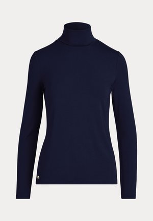Navy turtleneck top in soft, stretchy fabric. Features long sleeves and a fitted silhouette. Small logo accent near the hem.