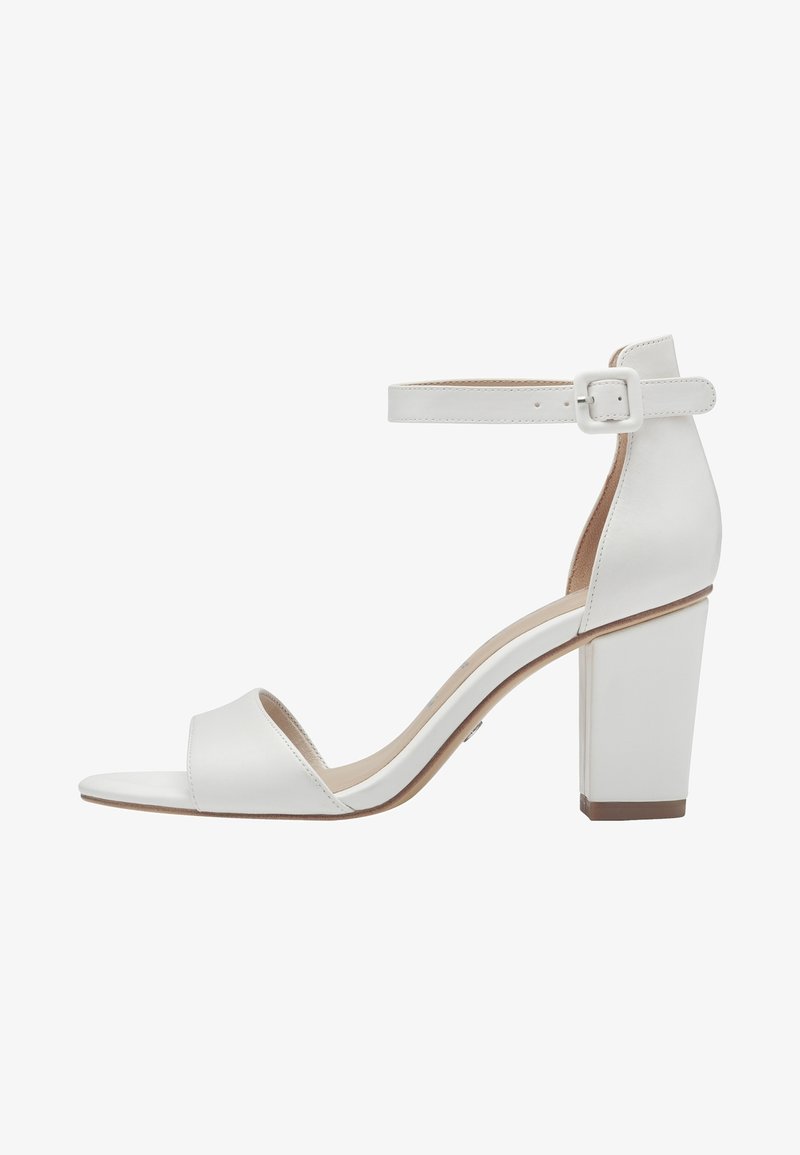 White leather high-heeled sandal with a block heel, open toe, wide front strap, and ankle strap with a buckle. Smooth texture and minimal design.