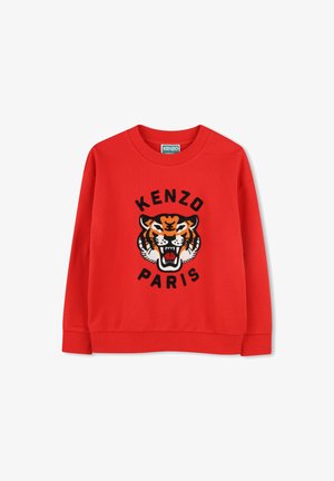 Czerwona bluza z wyraźnym haftowanym wzorem tygrysa i napisem "KENZO PARIS" poniżej. Żebrowane mankiety i dekolt. Miękka tekstura.