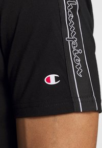 Champion T-shirt med print - black