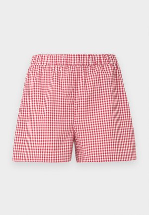 Calções com padrão de gingham em vermelho e branco, com cintura elástica, apresentando um corte descontraído e textura suave de algodão.
