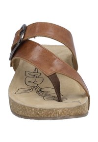 Brown leather sandals with a cross-strap design, featuring a metal buckle and a textured footbed with a floral print on a cork sole.