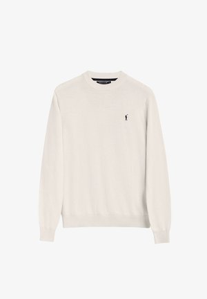 Maglione beige chiaro realizzato in materiale morbido, con colletto rotondo, maniche lunghe e un piccolo logo scuro sul lato sinistro del petto.