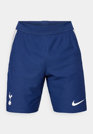 Blue sports shorts with vertical ribbed texture, elastic waistband, and white Nike logo on the right leg. Features side mesh panels.