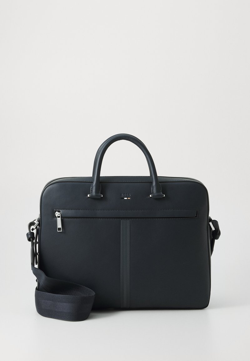 Black leather laptop bag with dual top handles, detachable shoulder strap, zippered front pocket, and vertical stripe accents.