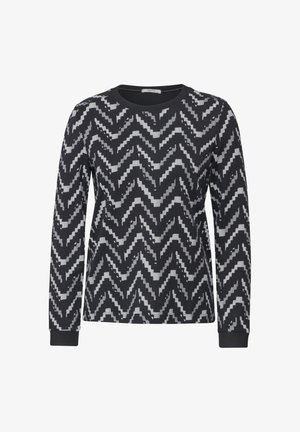 Černá dlouhá košile s dlouhým rukávem se vzorem zigzag v různých odstínech šedé. Kolo vystřižený výstřih a žebrované manžety. Měkká textilie.