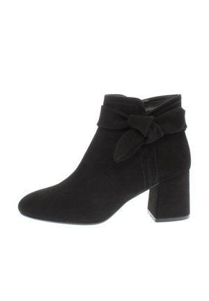 Black suede ankle boot with block heel and decorative tied bow around the ankle, shown from the side on a white background.