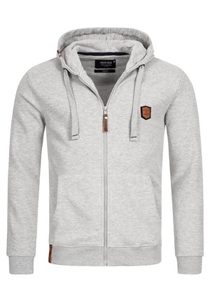 Siva zip-up dukserica s kapuljačom na vezanje, prednjim džepovima, rebrastim manžetama i logotipom na grudima. Izrađena od mekanog materijala za udobnost.