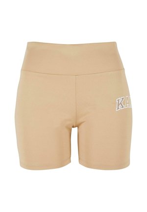 Beige sporta šorti ar augstu jostu, izgatavoti no elastīgas auduma. Uz kreisās puses ir balts logo un gluda tekstūra.