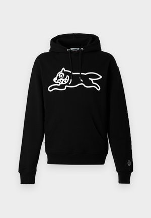 Hoodie noir en tissu doux avec un graphique blanc représentant un chat sautant aux traits faciaux exagérés et une poche avant.