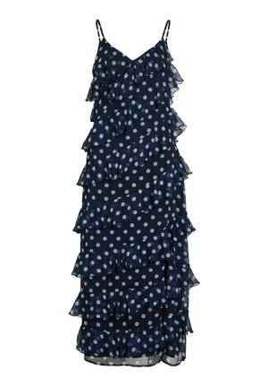 Robe bleu marine sans manches à pois blancs, avec des volants superposés et des bretelles fines.