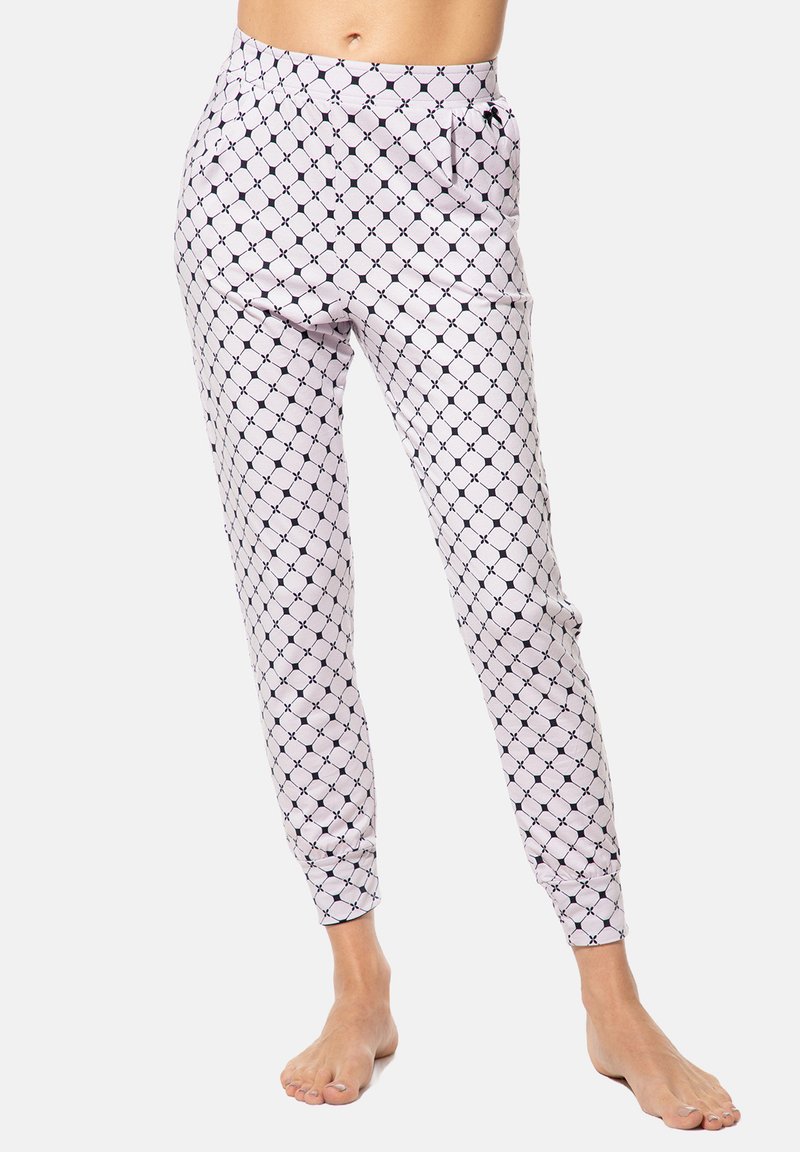 Musterhafte, enganliegende Hosen in zartem Rosa mit einem geometrischen Design in Dunkelblau, seitlichen Taschen und elastischen Knöchelabschlüssen.