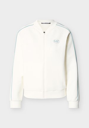 Fehér, cipzáras szabadidődzseki világoskék csíkozással az ujjakon és kis EA7 Emporio Armani logóval a bal mellrészen.