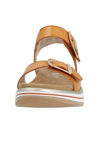 Sandalen aus braunem Leder mit zwei verstellbaren Riemen, silbernen Schnallen, einer gepolsterten Innensohle und einer weiß-orange gestreiften Sohle.