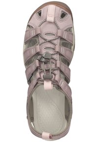 Light pink sandal with multiple grey straps, rubber sole, and textured footbed. Features adjustable buckle for secure fit.