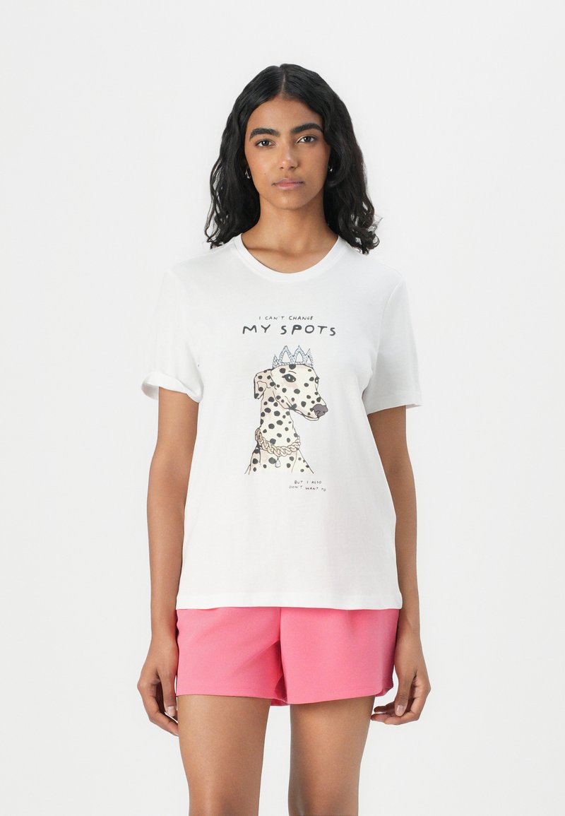 White cotton T-shirt featuring a graphic of a spotted dog wearing a crown and necklace, with black text above and below the illustration.