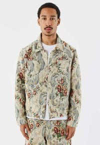 Lichte jas - gris fumé