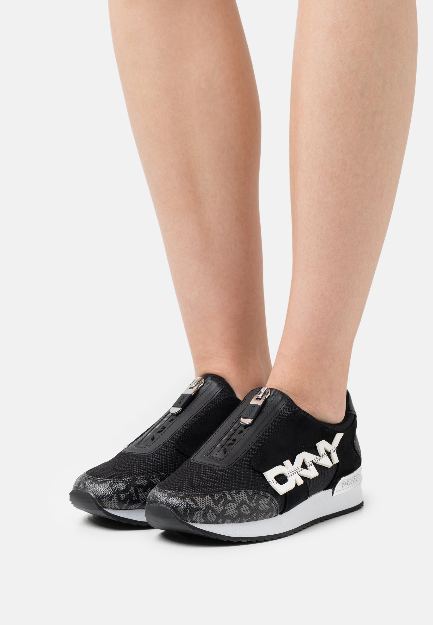 black zip up trainers