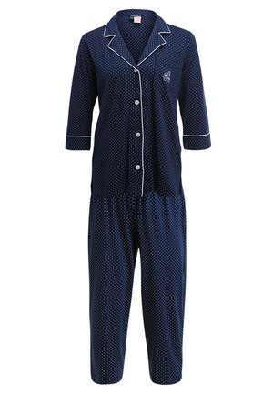 Completo pigiama blu navy a pois con piping bianco, caratterizzato da una camicia con bottoni a maniche 3/4 e pantaloni cropped con vita elastica.