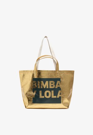 Borsa tote metallica dorata con una texture liscia, caratterizzata da una grafica verde scuro che riporta la scritta "BIMBA Y LOLA" in lettere dorate e in grassetto.