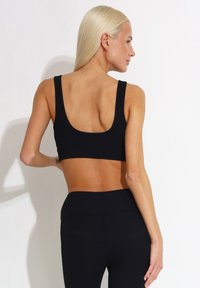 Carlheim SPORTS HELLE ACTIVE HIGH SUPPORT - Steznik - black