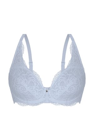 Weißer Spitzen-BH mit floralen Mustern, verstellbaren Trägern und einem kleinen herzförmigen Anhänger in der Mitte vorne.