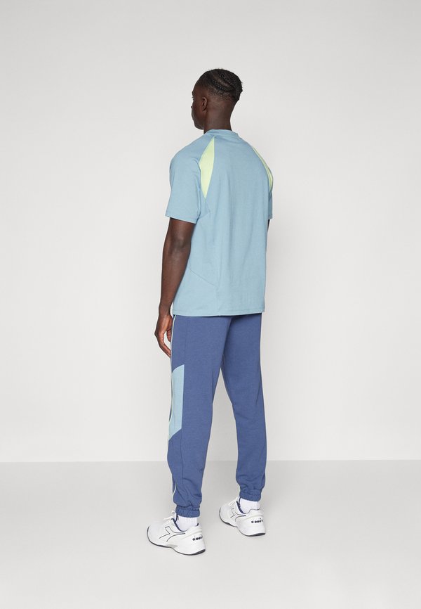 ATHLETICS PANT - Tracksuit bottoms - vintage indigo2