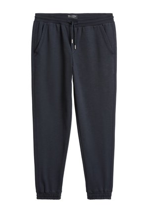 Mornarske trenirka hlače od mekanog tkanina, s elastičnim pojasom, vezicom, bočnim džepovima i skupljenim manžetama za suženi kroj.