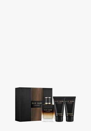 Coffret cadeau parfum Elie Saab L'Homme avec boîte noire et dorée, flacon de parfum en verre, gel douche parfumé et tubes de baume après-rasage.