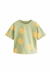 Zielony T-shirt z bawełny z grafiką wzoru żółtych słońc z uśmiechniętymi twarzami. Krótkie rękawy i luźny krój.