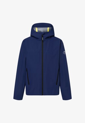 Giacca blu navy con cappuccio, cerniera frontale, due tasche laterali con zip e testo del marchio discreto sulla manica sinistra.