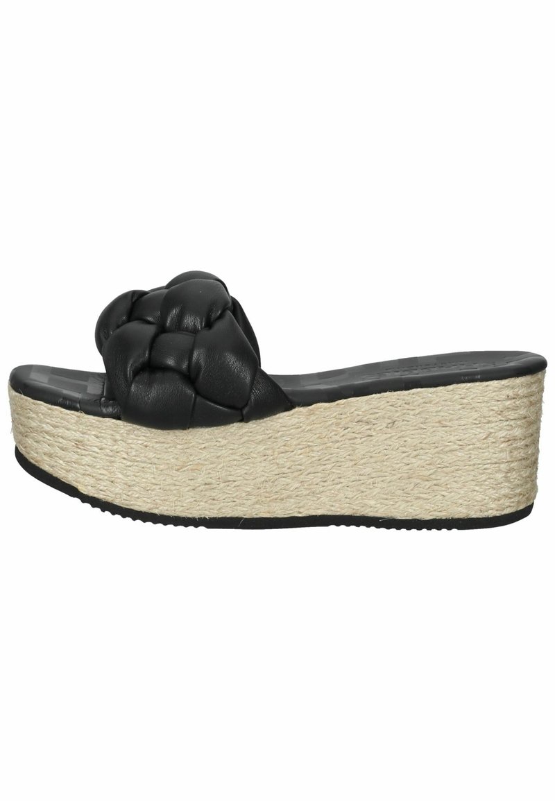 Sandale à plateforme avec bride tressée noire, semelle compensée en jute beige tissé et semelle inférieure noire rainurée.