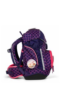 Purple backpack featuring pink mermaid scale pattern, reflective accents, and multiple compartments, including a side pocket with a circular shell design.