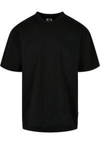 Black cotton t-shirt with a crew neck, short sleeves, and a relaxed fit. Features a small logo tag on the lower side.