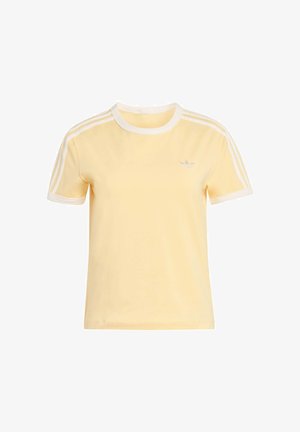Yellow cotton t-shirt featuring a crew neck, short sleeves, white accents, and a small logo on the chest. Three white stripes on shoulders.