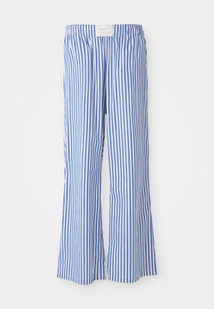 Pantalons rayés bleus et blancs avec une coupe décontractée, fabriqués en tissu léger, dotés d'une taille élastique et d'une discrète étiquette de logo.