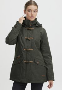 Olive green parka jacket with a textured fabric, toggle fastenings, and large pockets. Features a high collar and removable hood.