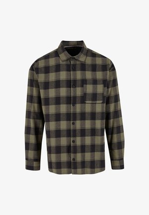 Kockovaná flanelová košeľa v tmavozelenej a čiernej farbe. Má dlhé rukávy, golier a náprsné vrecko. Vyrobená z mäkkej textúrovanej tkaniny.