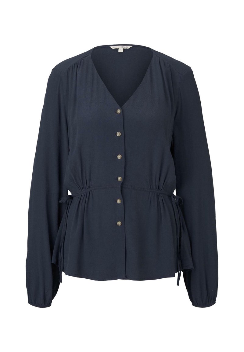 Námořnická modrá blůza s dlouhým rukávem, výstřihem do V, knoflíkovým zapínáním, stahovacími šňůrkami v pase a řasením na ramenou a rukávech.