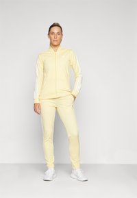 adidas Sportswear ESSENTIALS 3-STRIPES - Treniņtērps - almost yellow/white